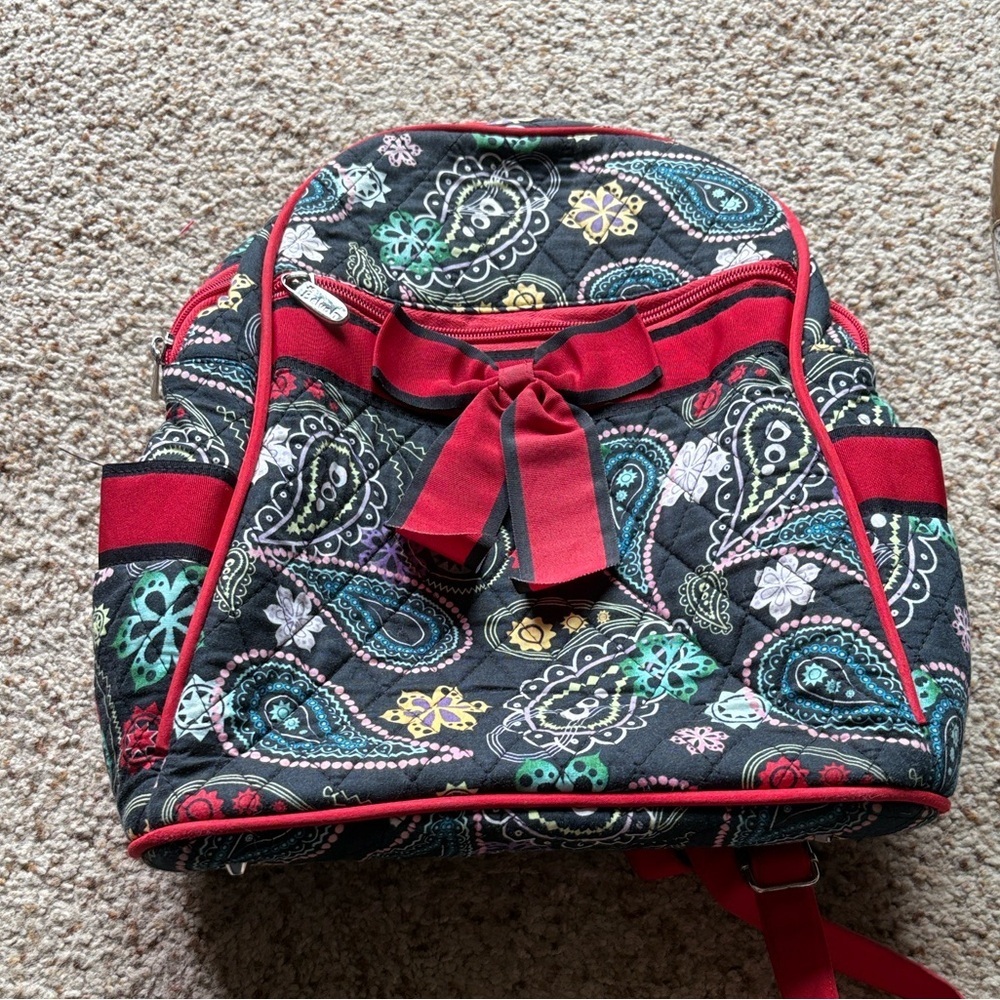 Quilted backpack in a Paisley Patternwith Red Accents by Belvah